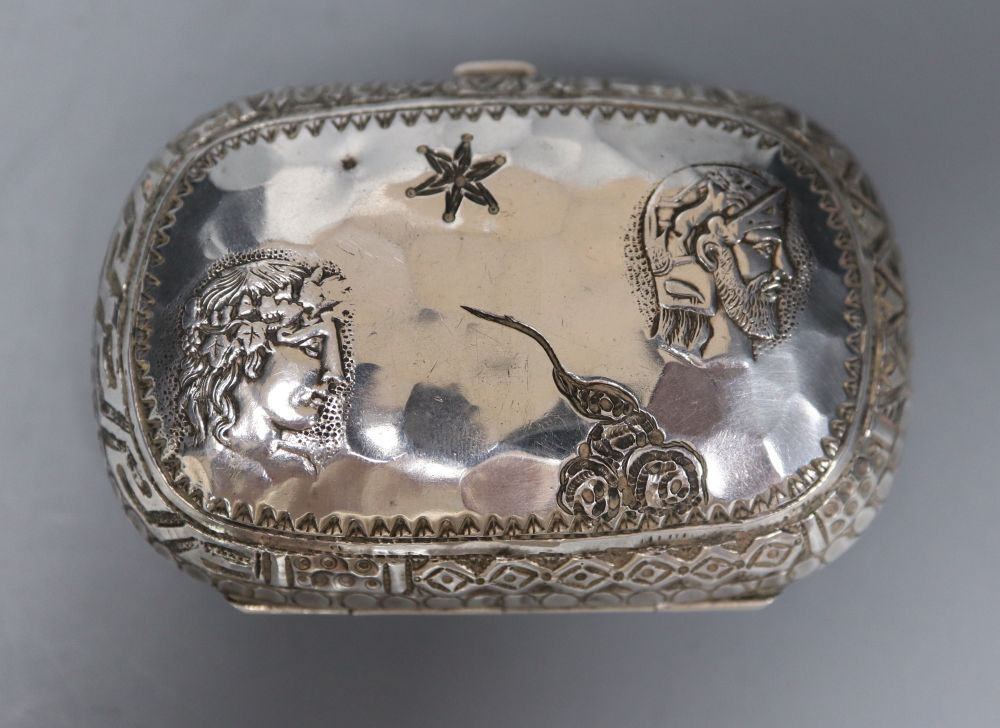 A Victorian silver mounted ovoid purse, decorated with Greek busts, Levy & Salaman, Birmingham, 1884, 72mm.